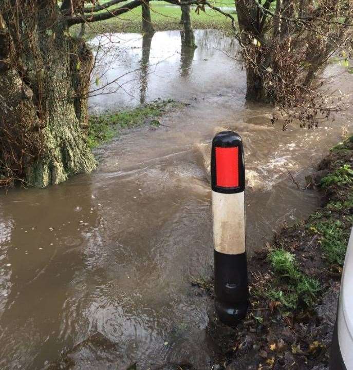 Water is flowing off the roads and into the surrounding fields