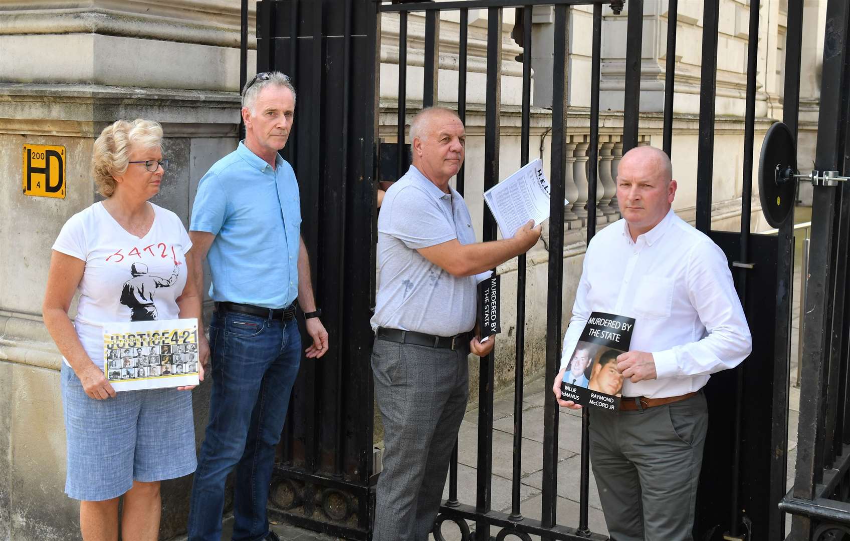 (left to right) Julie Hambleton, Joe Campbell Jnr, Raymond McCord and Billy McManus (Dominic Lipinski/PA)