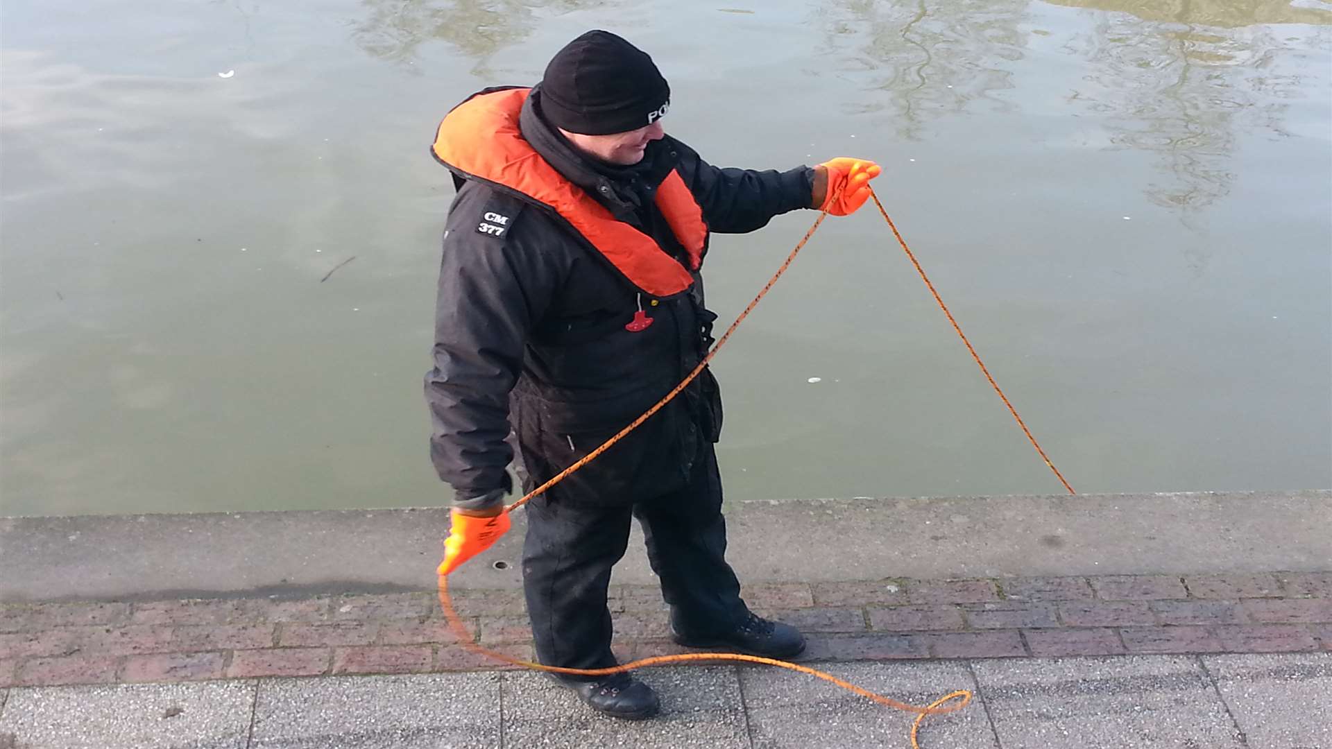 Police divers are searching the river