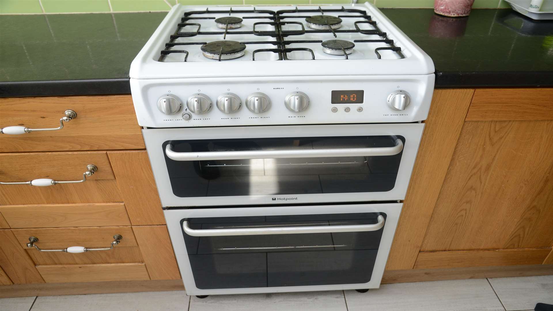 The oven door shattered, showering the kitchen with glass