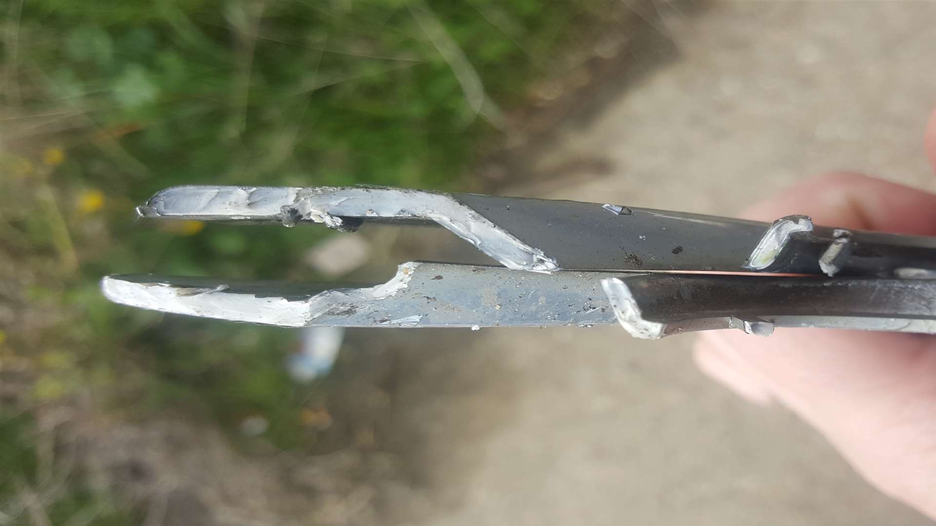 Sheared off metal following the crash