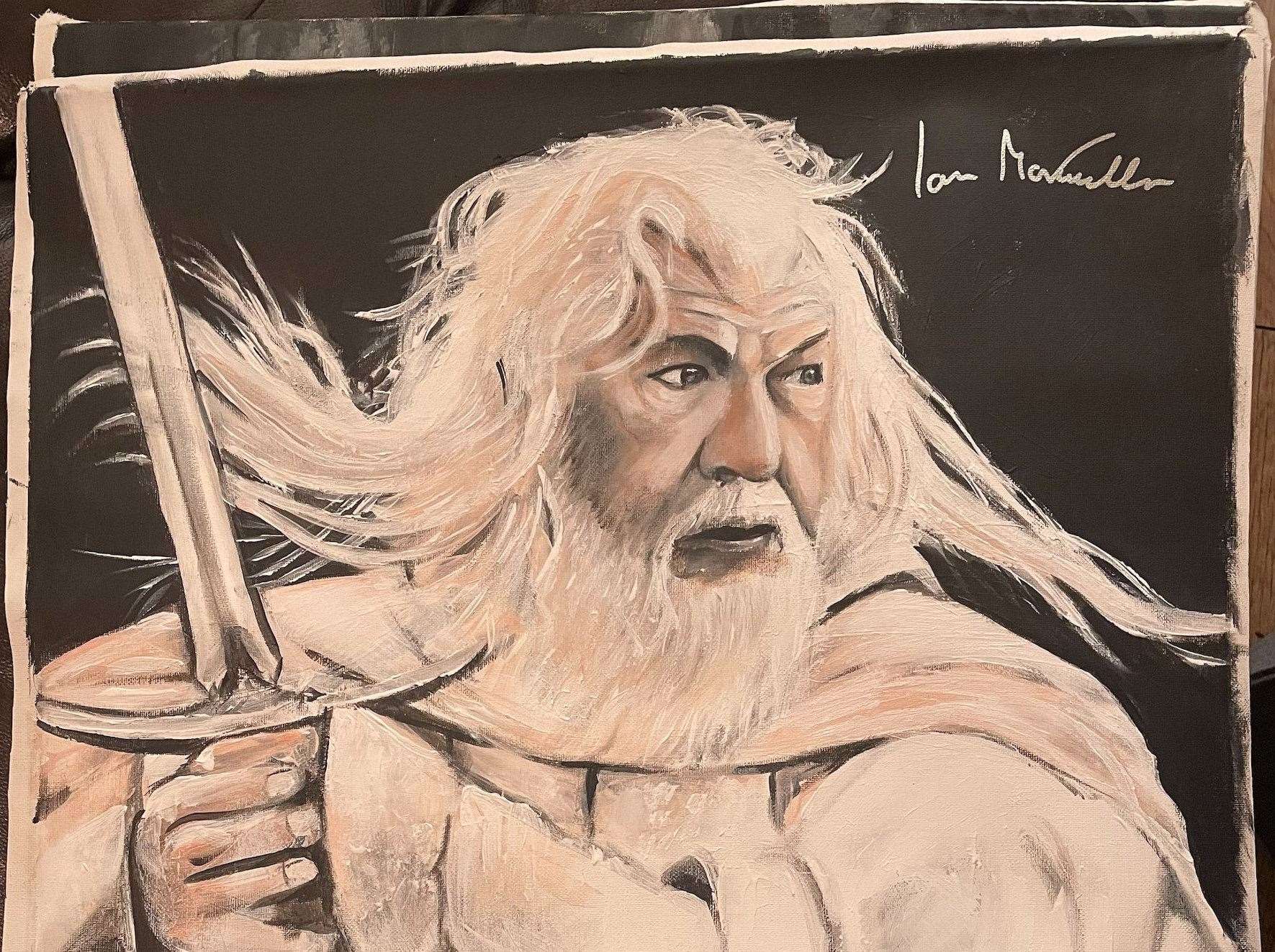 Sir Ian McKellen artwork signed by the 'imposter'. Picture: SWNS