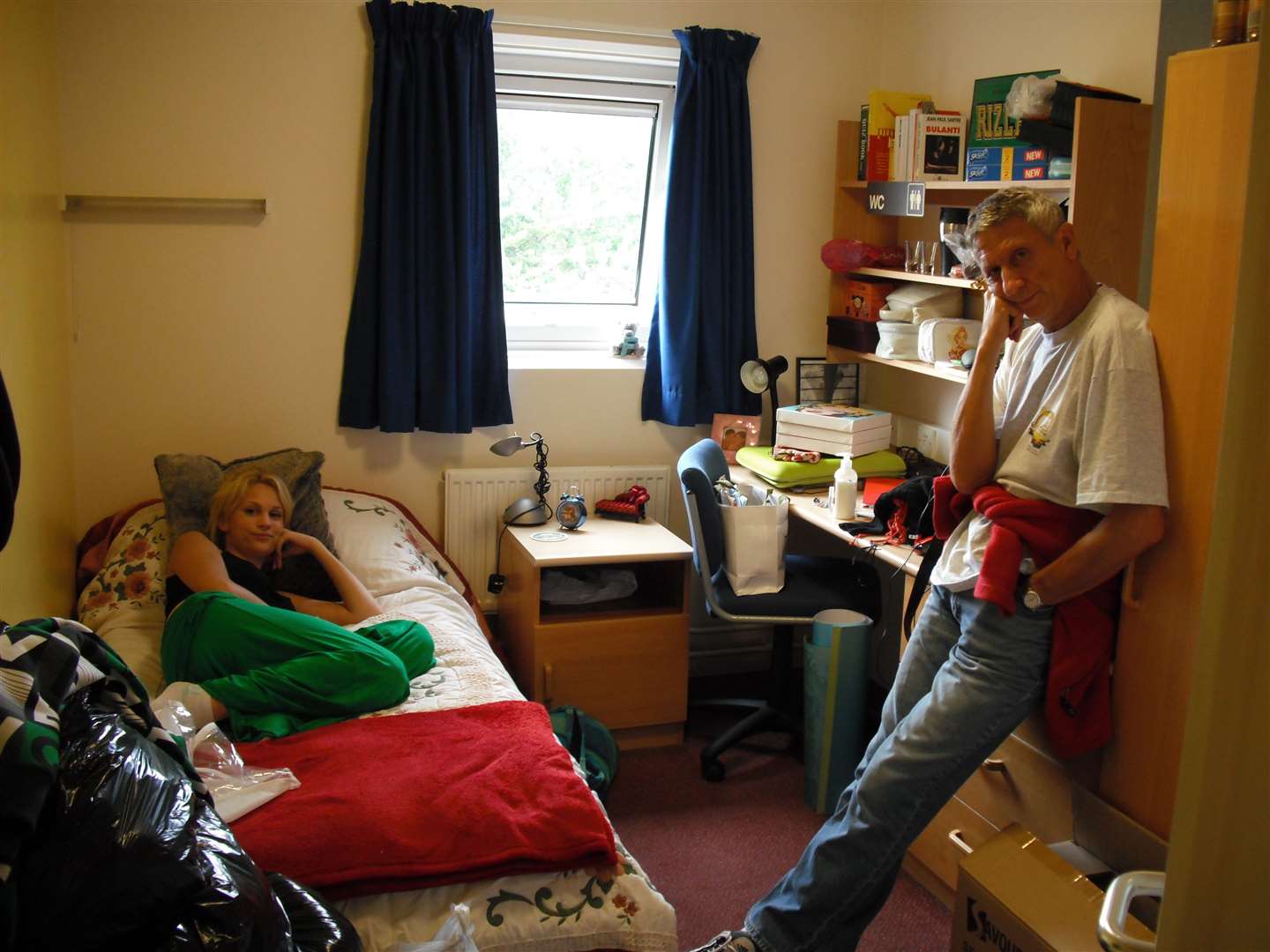 Farah and her dad, Osman, in her room in Tyler Court. Picture: Farah Zeynep Abdullah