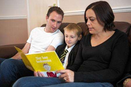 Kieran Arphey with his stepdad David Monk and mum Clare Arphey. Kieran went to the House of Commons last week with his stepdad to highlight the need for children with cancer to be kept up to date with their education.