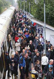 Passengers at the high speed train service to Sandwich during The Open golf tournament
