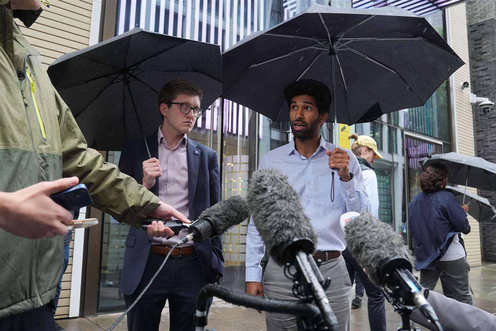 Dr Robert Laurenson, left, and Dr Vivek Trivedi, co-chairmen of the BMA’s junior doctors committee, spoke to the media after a meeting with the Health Secretary on July 9 (Lucy North/PA)