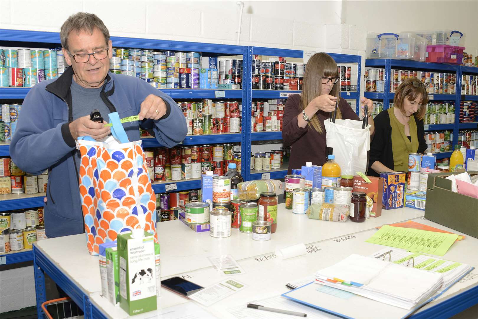 Canterbury Food Bank volunteers pack food parcels