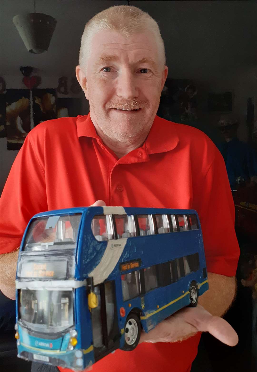 Maidstone man Garry Baillie with one of his remote-control buses. Picture: Garry Baillie