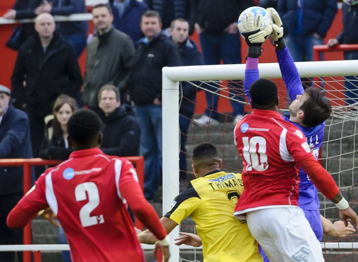 Ex-Fleet 'keeper Brandon Hall snatches the ball away from Bradley Bubb Picture: Andy Payton