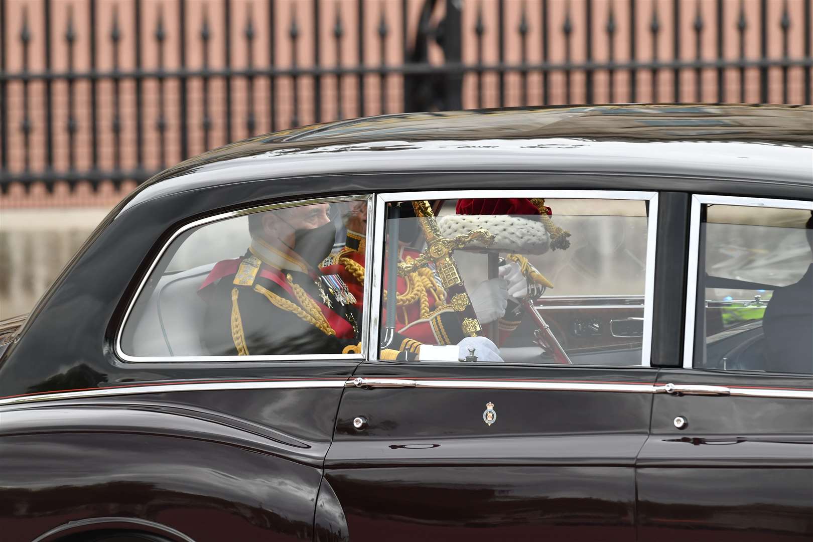 The Great Sword of State, and the Cap of Maintenance is taken from Buckingham Palace to Westminster (Dominic Lipinski/PA)