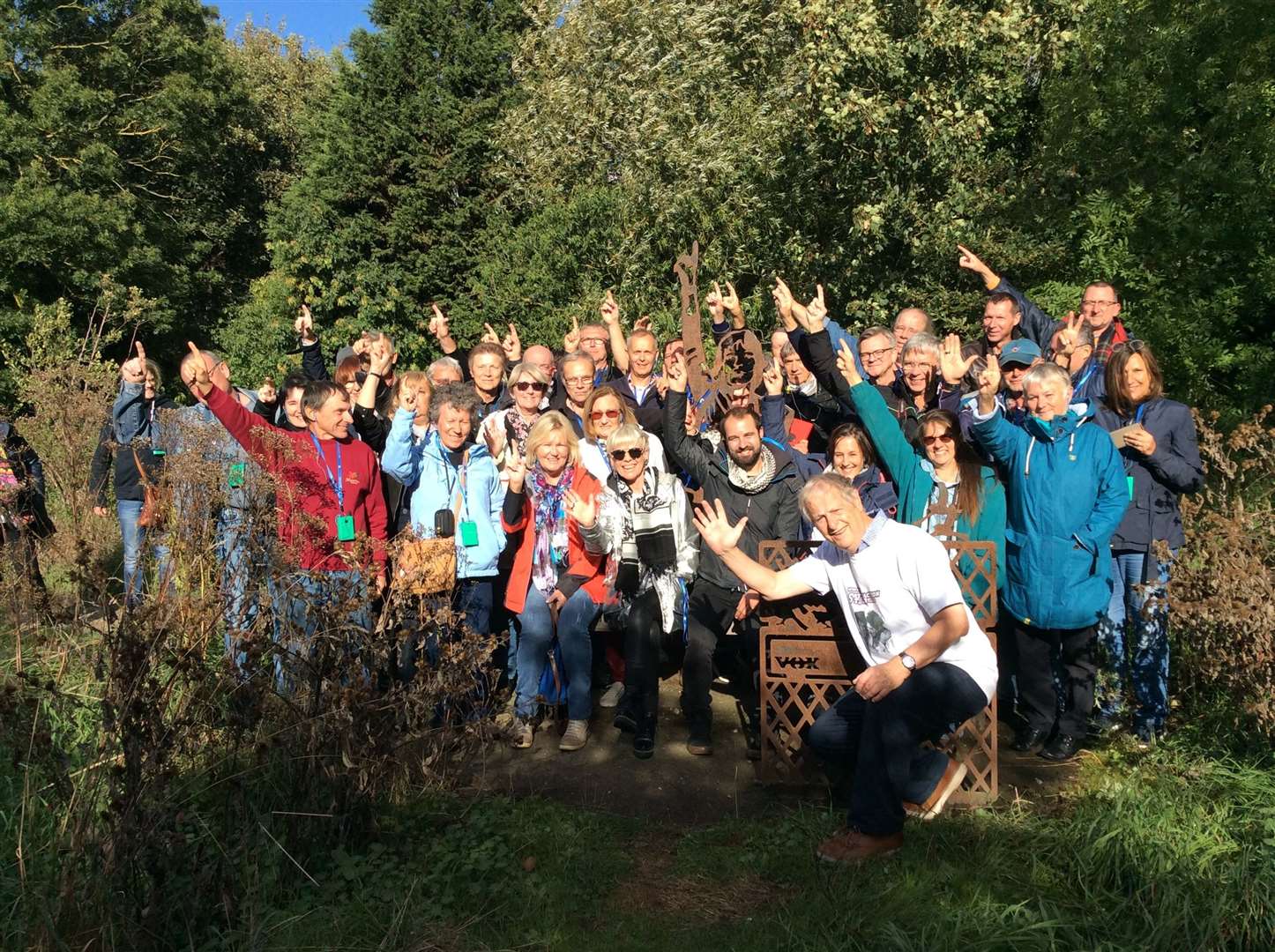 Ken Pimm (front) with a Satisfaction Tour crowd at the Mick Jagger sculpture in Central Park, Dartford