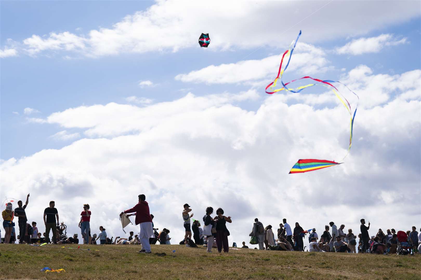 People fly their kites at the event to mark a year since the Taliban takeover of Afghanistan (Kirsty O’Connor/PA)