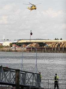 RAF helicopter hovers above the River Medway. Picture: Peter Still