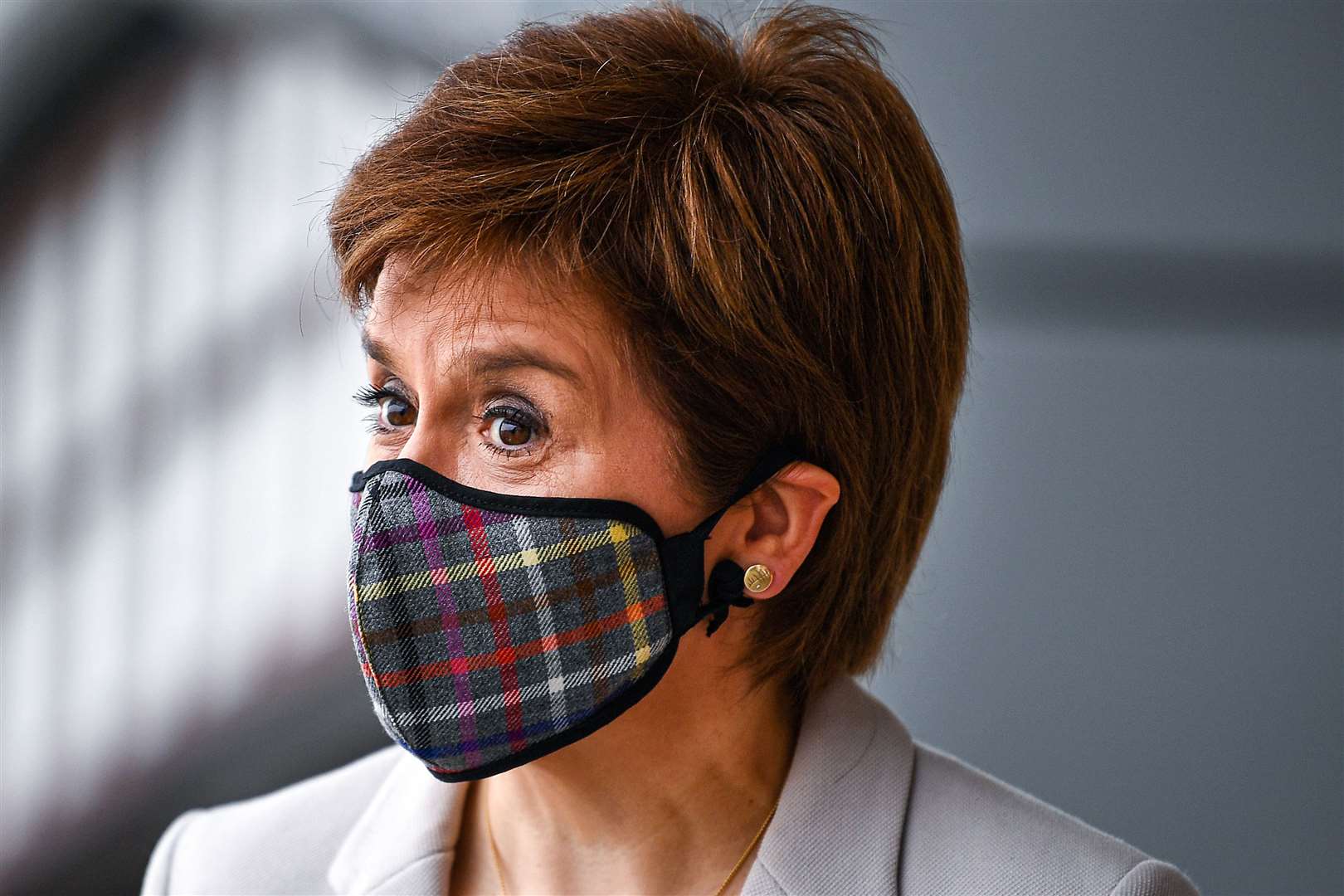 First Minister Nicola Sturgeon wearing a tartan face mask during a visit to an Edinburgh shop last week (Jeff J Mitchell/PA)