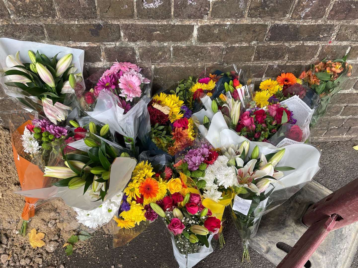 Floral tributes have been left at the scene