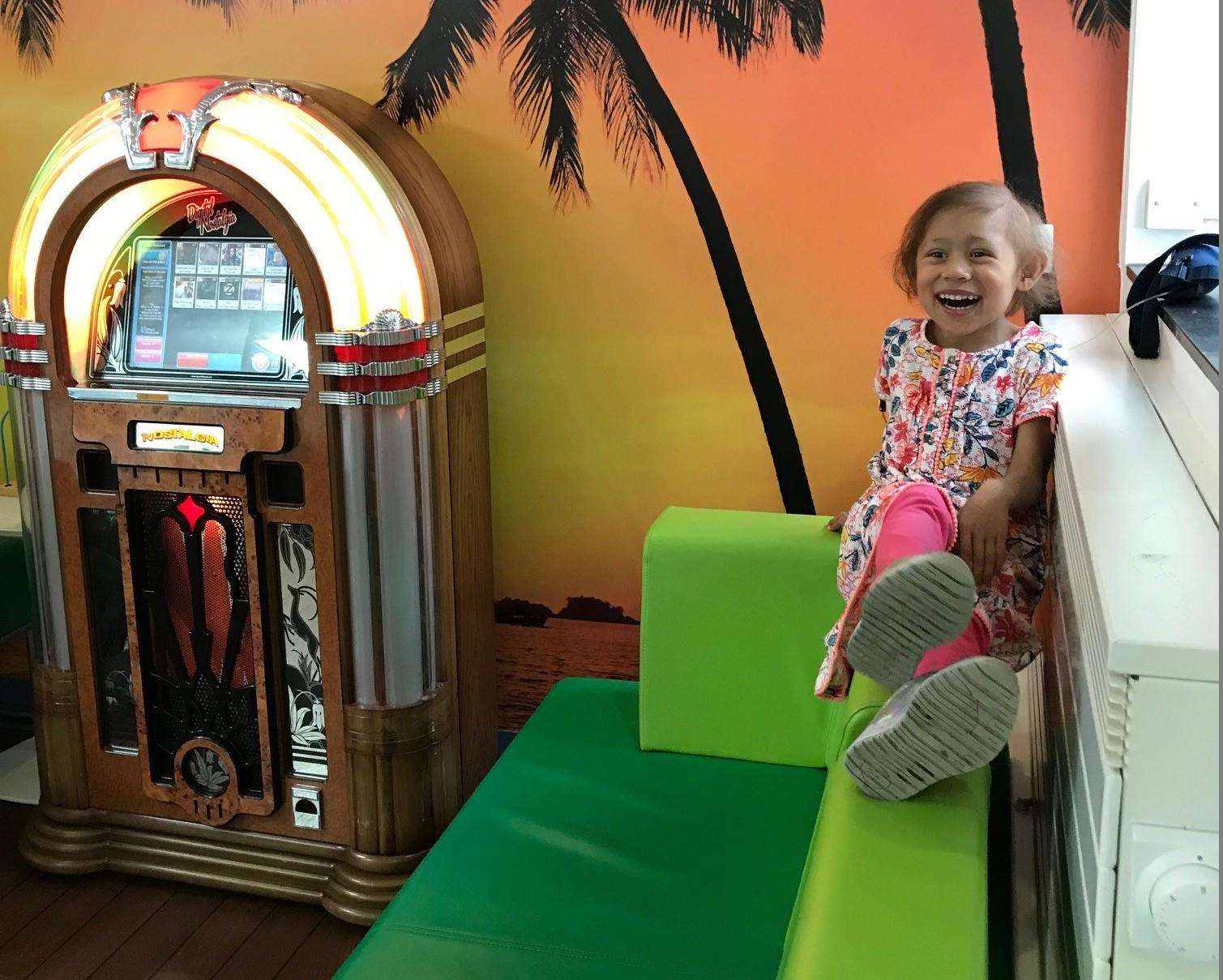 Maya listening to Ed Sheeran on the jukebox at the Royal Marsden