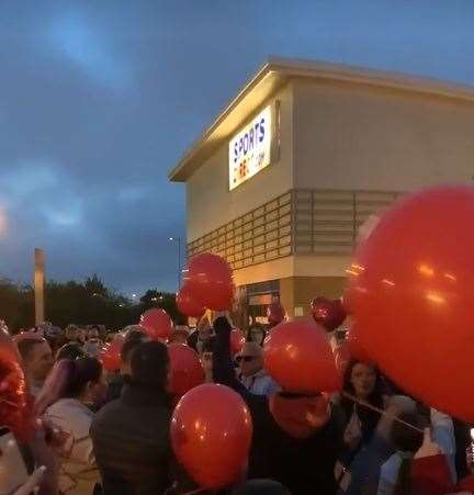 Members of the Dirtee South Sheppey car club gather in Neats Court retail park car park at Queenborough, Sheppey, and release red balloons in memory of Sittingbourne teenager Cavan Scott, 19, who died when his bicycle was in collision with a car in Lower Road, Teynham. Picture: Ricky Bain