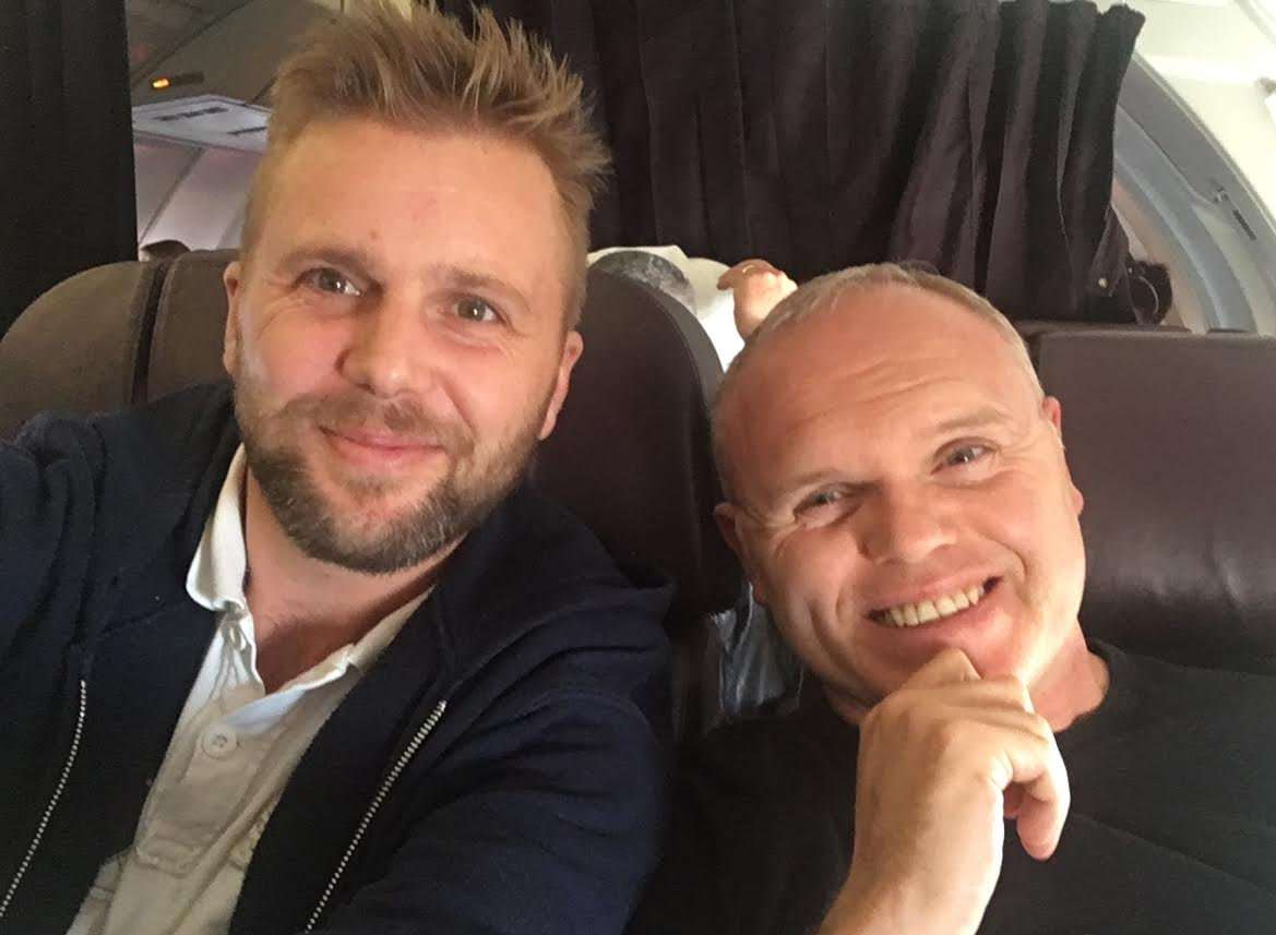 James Roberts with hypnotist Jason O'Callaghan on the plane. Picture: SWNS