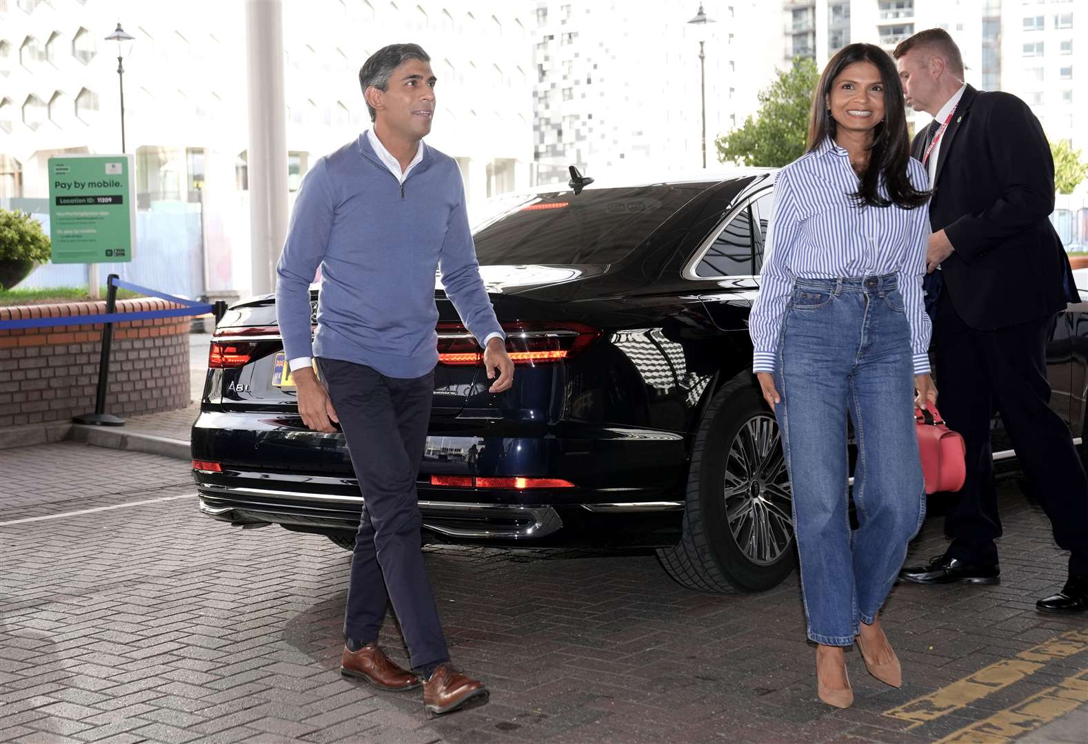 Rishi Sunak with his wife Akshata Murty arriving in Birmingham on the eve of the Conservative Party annual conference (Stefan Rousseau/PA)