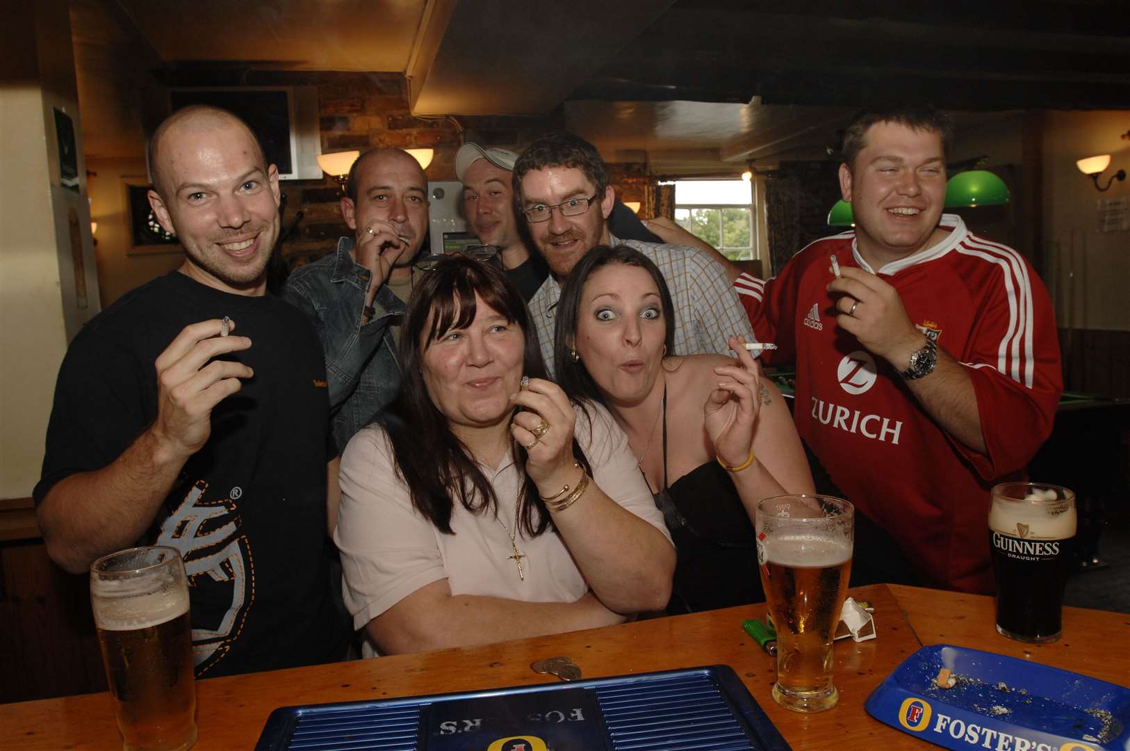Punters at Ye Old Leather Bottle in Dover Road, Northfleet, on June 30, 2007, making the most of the last day before the smoking ban in pubs. Picture: Nick Johnson