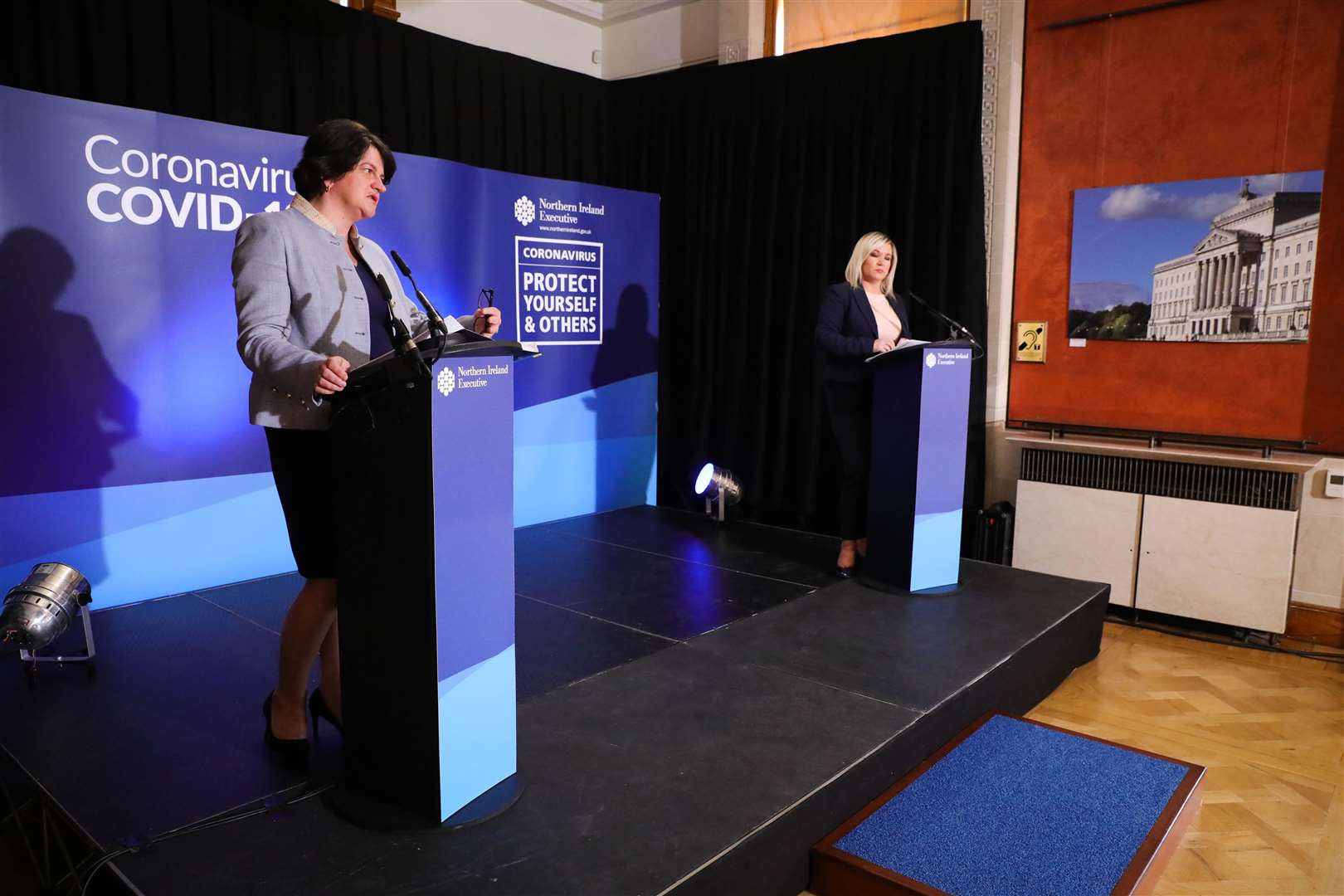 First Minister Arlene Foster (left) and Deputy First Minister Michelle O’Neill (right) defending the executive’s response to the crisis impacting the aviation sector (Presseye/PA)