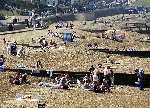 People soaking up the sun on Herne Bay beach