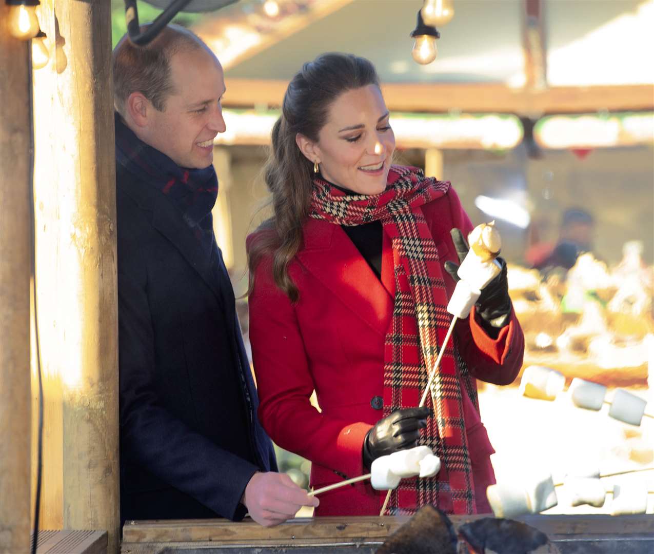 The Duke and Duchess of Cambridge toast marshmallows during a visit to Cardiff Castle in December during their three-day royal train trip to thank keyworkers around the country (Jonathan Buckmaster/Daily Express/PA)