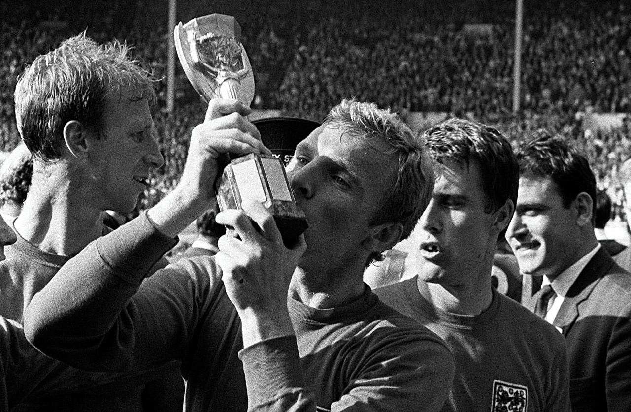 Bobby Moore kisses the Jules Rimet trophy after success over West Germany