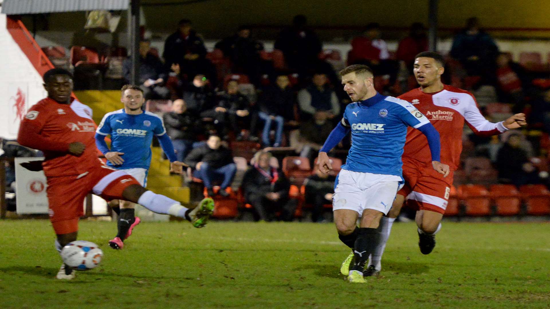 Dover captain Nick Deverdics tucks home the second. Picture: Keith Gillard