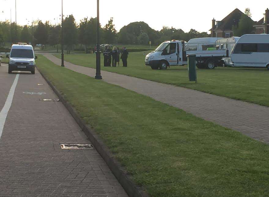 Travellers talking to police