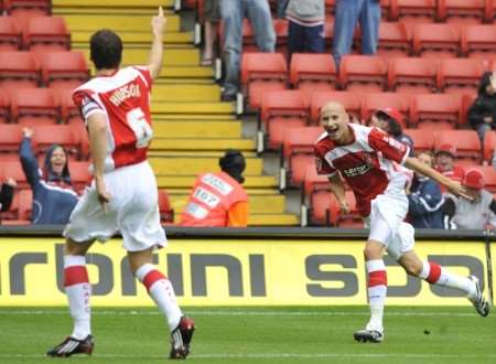 Mark Hudson celebrates his early goal with Jonjo Shelvey. Picture: Barry Goodwin