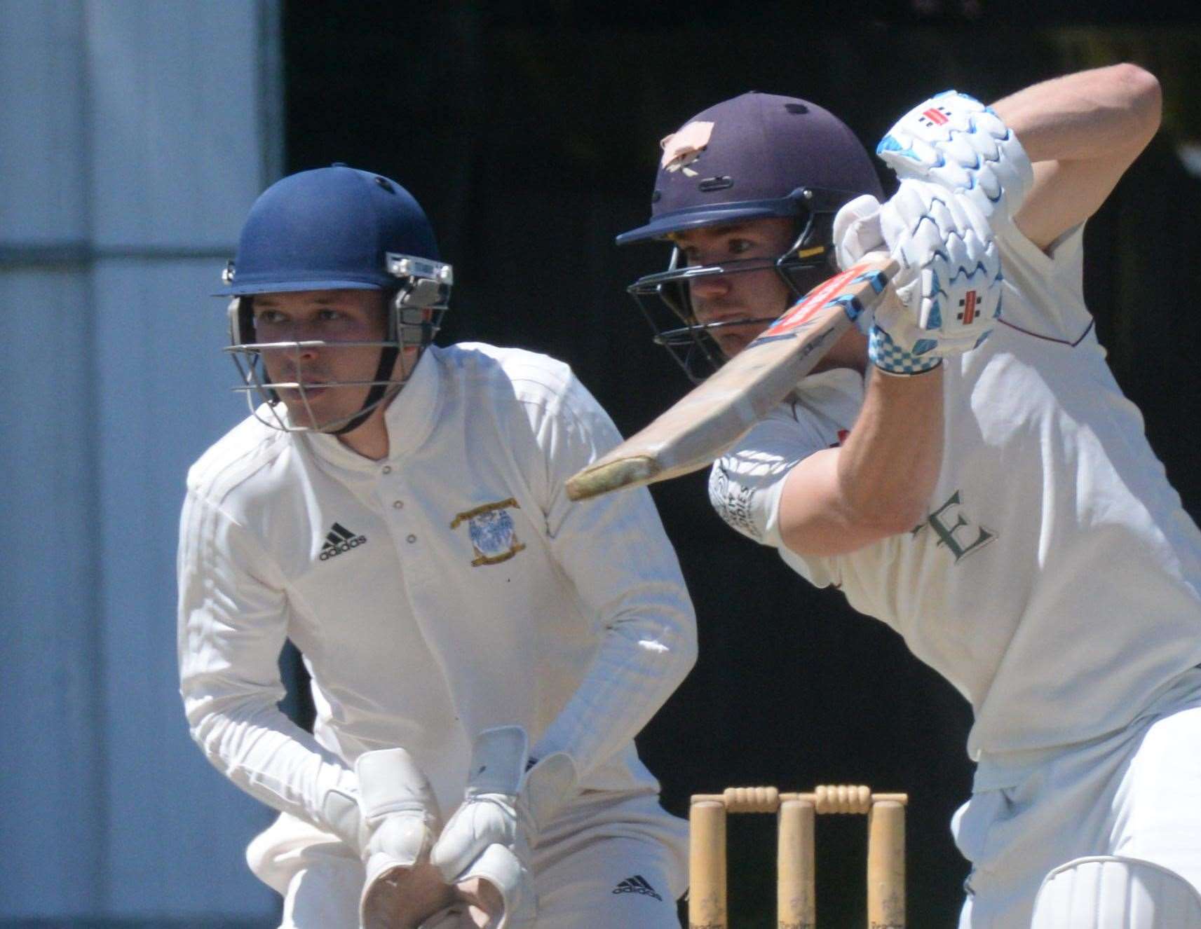 Bexley's Matt Cross and Canterbury keeper Sam Burt during the match at Polo Farm on Saturday. Picture: Chris Davey