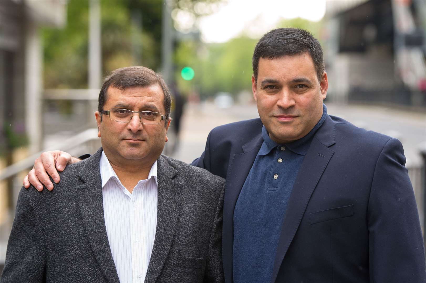 Ihsan Bashir (left) with the head of the Docklands victims’ campaign group Jonathan Ganesh (Dominic Lipinski/PA)