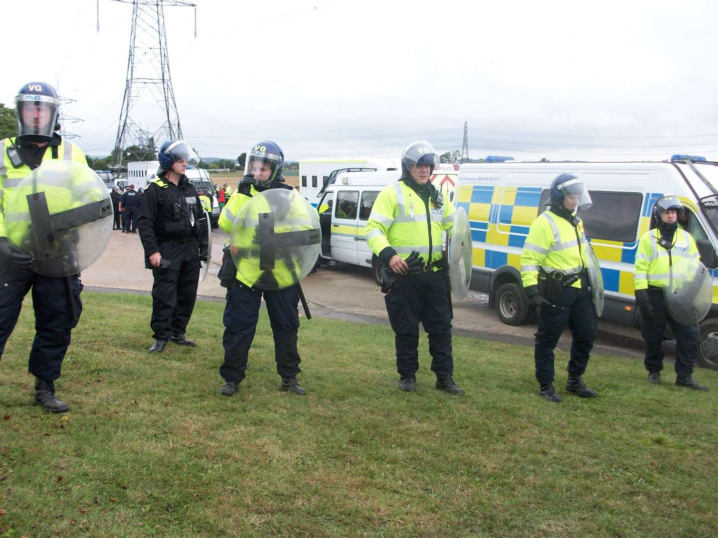 Riot police arrive at the camp