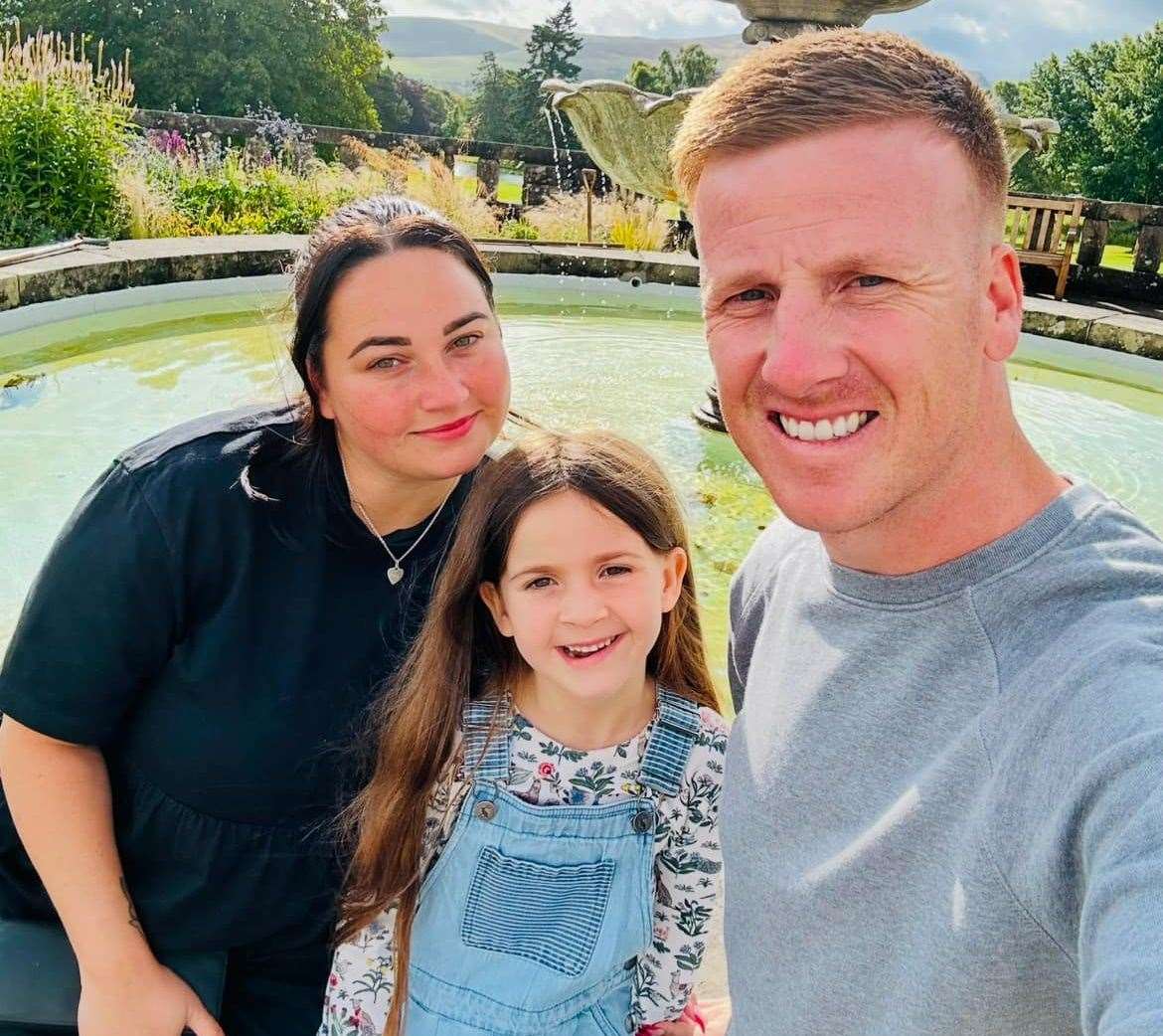 Joules Smith with her parents Elisha and Joe