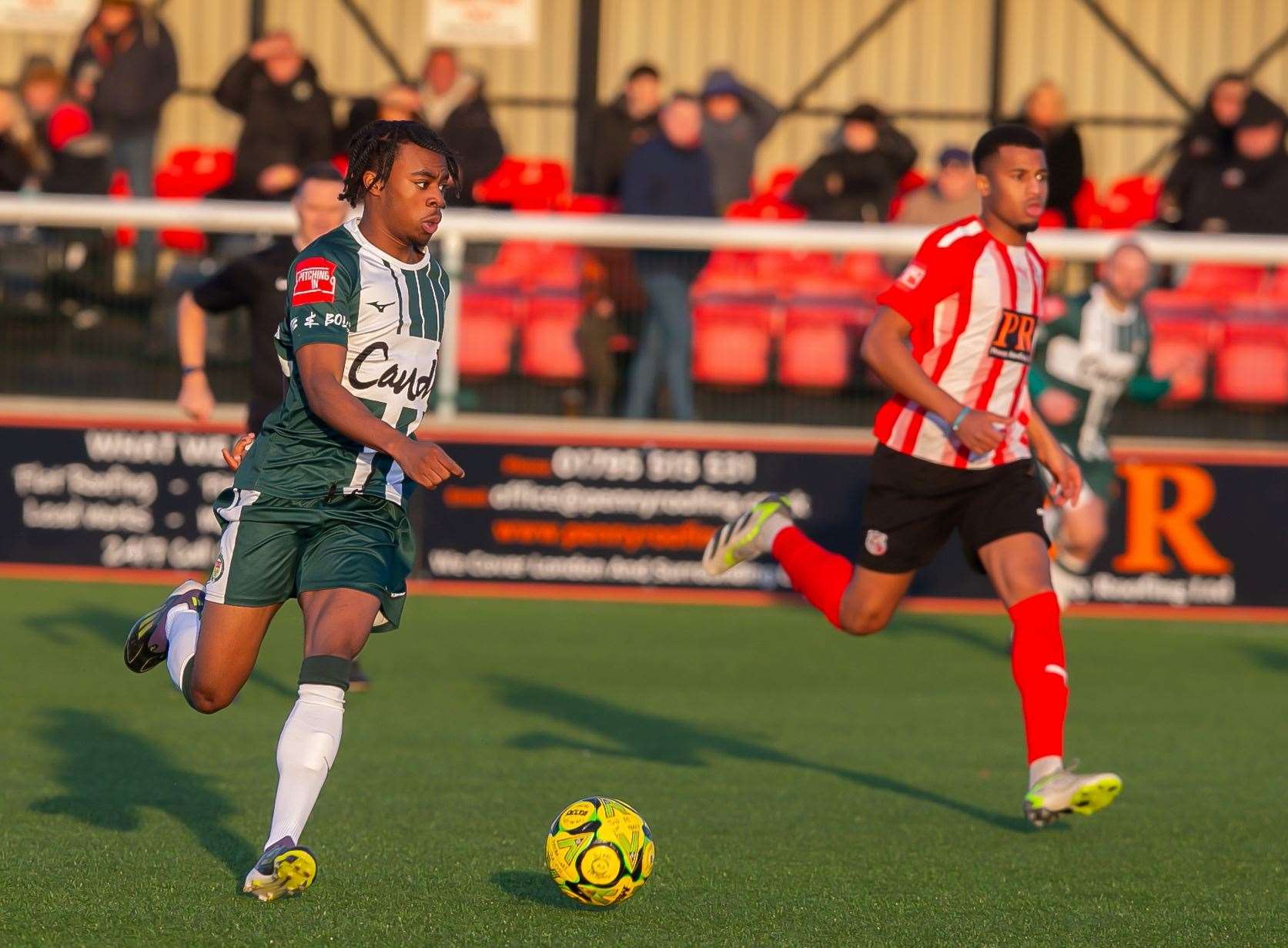 Ashford United winger Gabe Campbell runs at the Sheppey defence. Picture: Ian Scammell