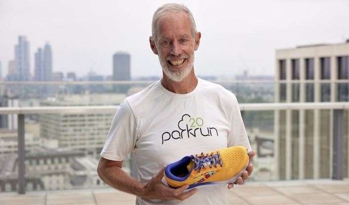 Paul Sinton-Hewitt with the Brooks Ghost 16 parkrun trainers created to celebrate the event’s 20th anniversary (Tom Harrison/PA)