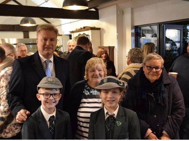 Tom Allsworth, chairman of Elliott Park Primary School, and pupils hand over cash to Care4Christmas on Sheppey