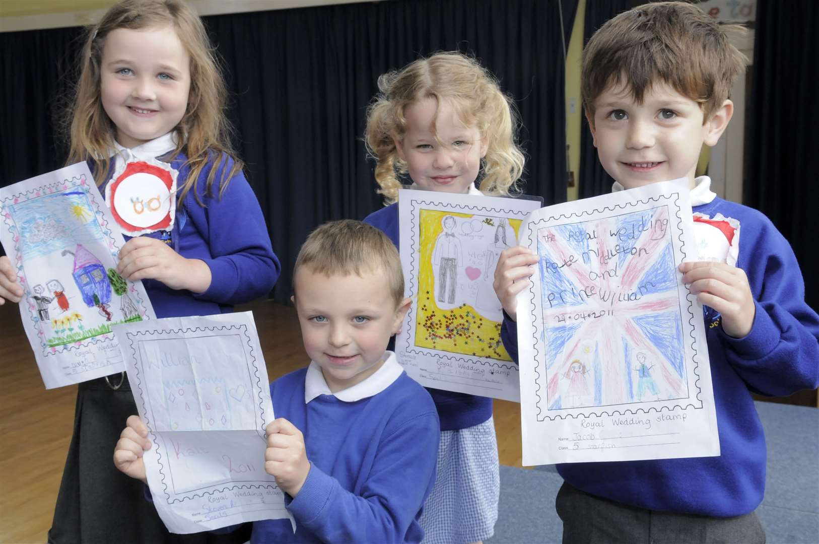 Year R pupils (from left) Devon, Steven, Kaitlin and Jacob took part in a Wills and Kate stamp competition at Thames View Infant School, Rainham. Picture: Andy Payton
