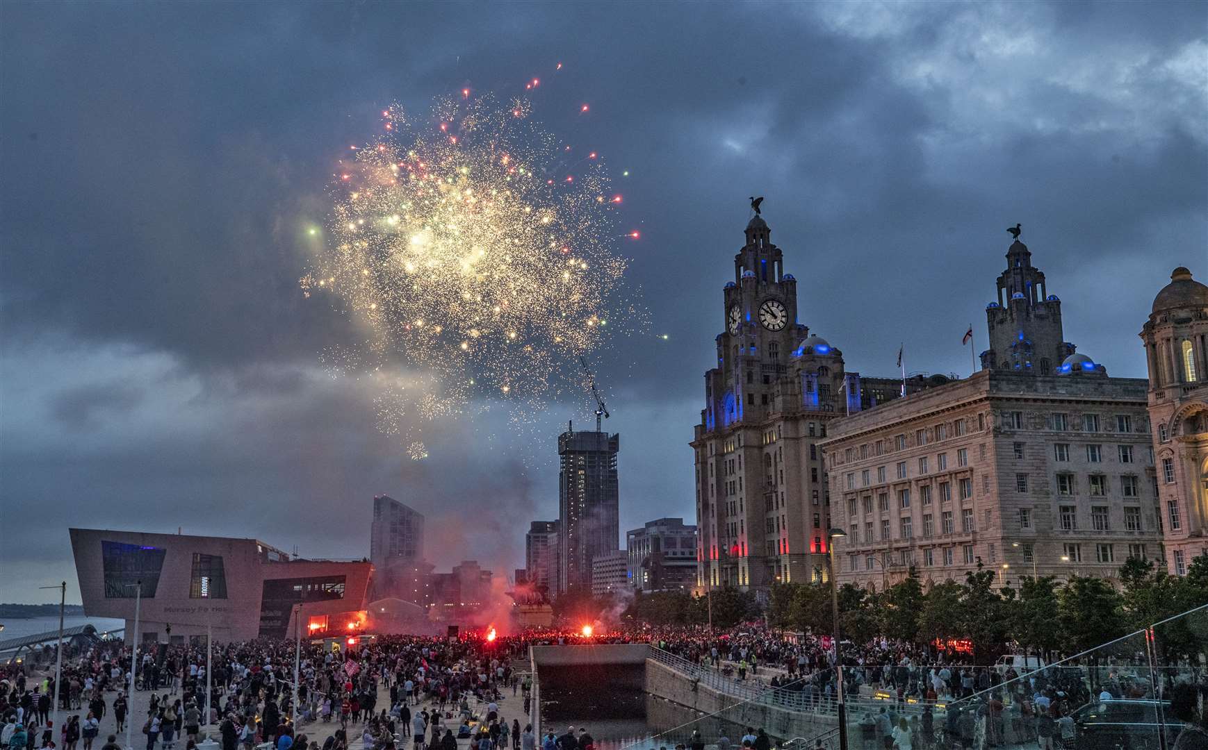 Fireworks go off outside the Liver Building in Liverpool after Jurgen Klopp’s side won the Premier League title (Peter Byrne/PA)