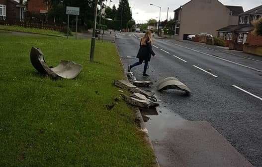 Passers by helped to clear up the debris (12228124)