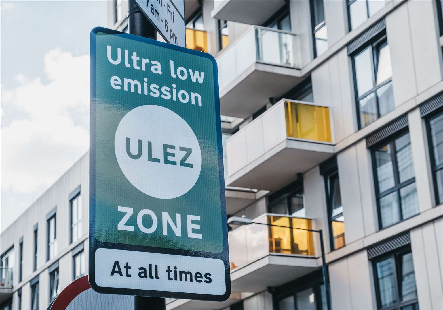 Signs indicating Ultra Low Emission Zone (ULEZ) on a street