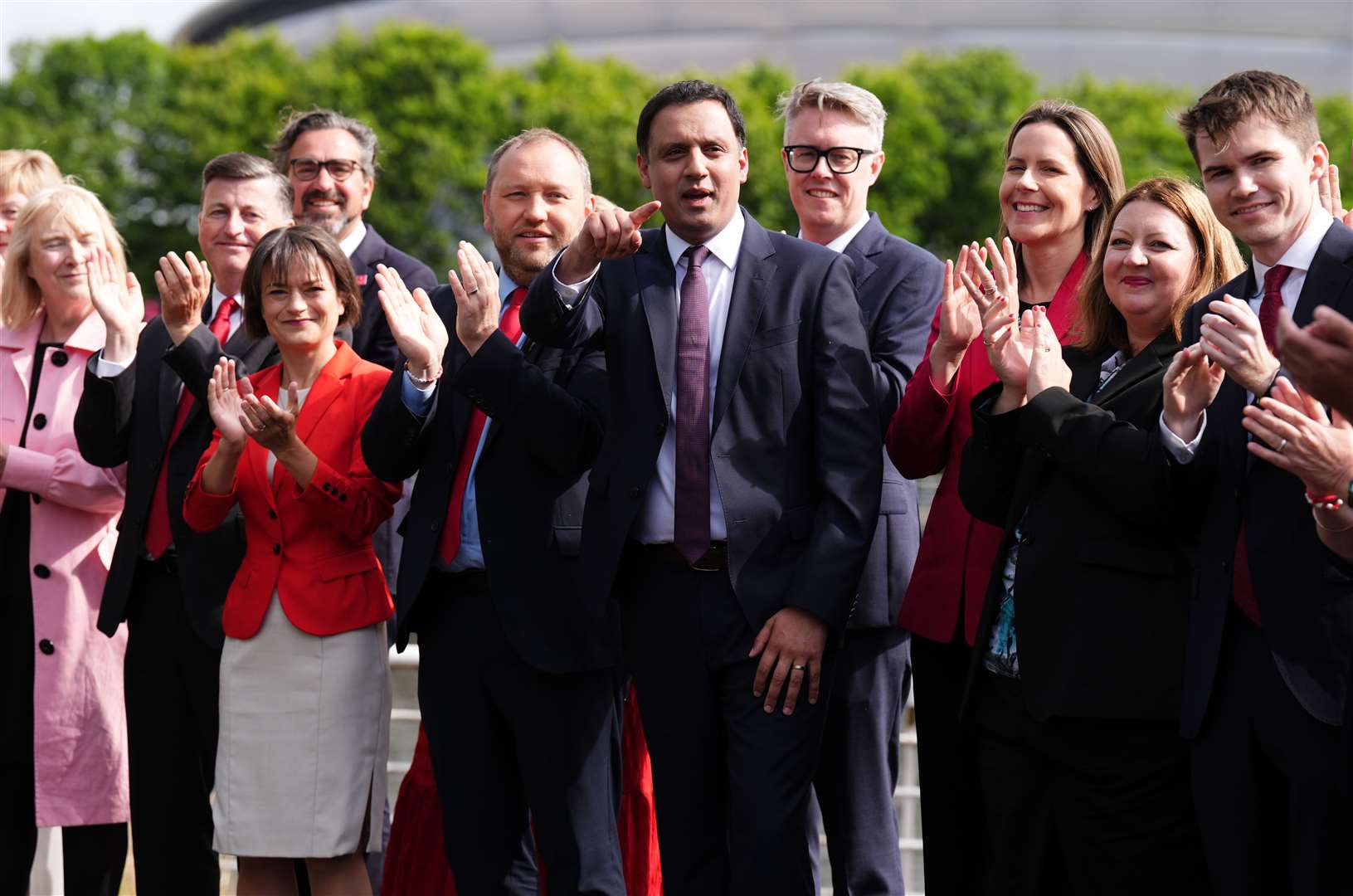 Scottish Labour leader Anas Sarwar with some of the newly elected Labour MPs at Four Winds Pavilion in Glasgow (Andrew Milligan/PA)