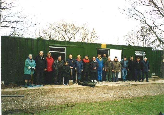 Members from the society standing outside the containers that were put up in 1994. Picture: GMME (7205708)