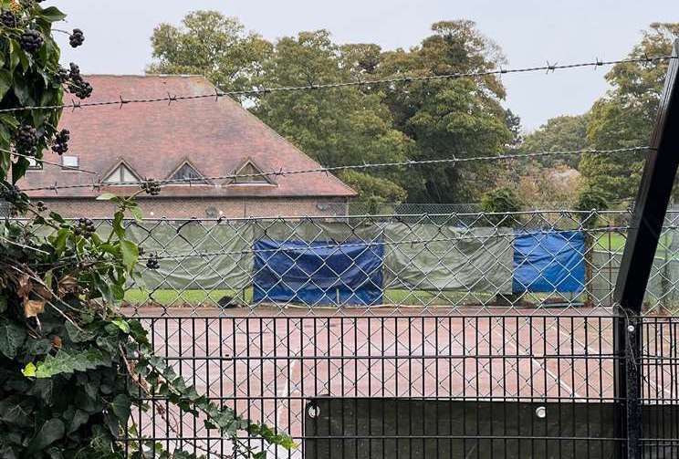 Manston immigration centre - glimpsed from behind fences