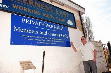 WORSE FOR WEAR: Club manager Dave Smith points out the poor state of the car park