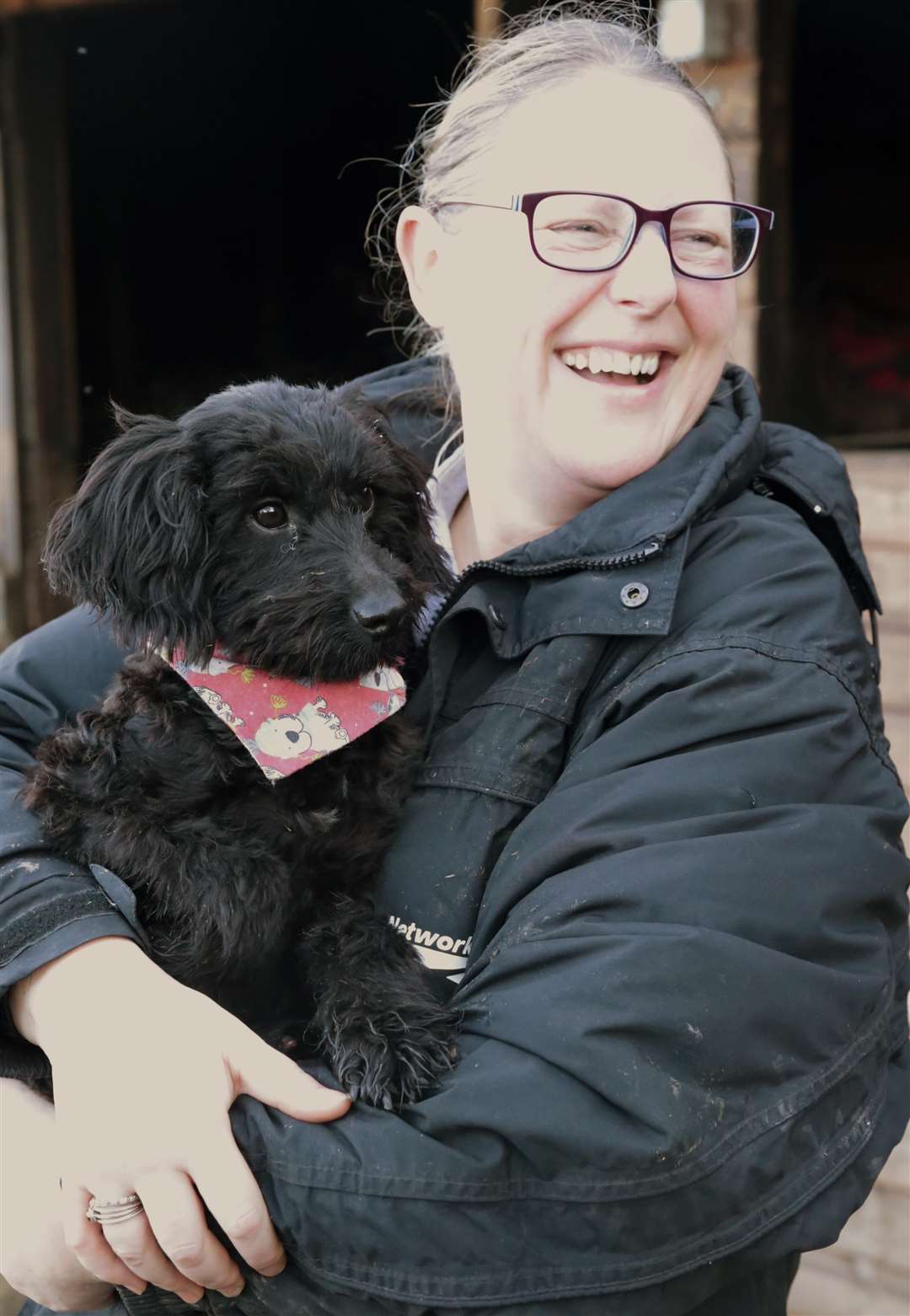 Floyd having a cuddle with Anim-Mates volunteer Sarah Williams