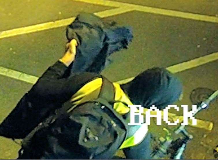 CCTV footage showed Headcorn thug Billy Williams riding a bicycle while carrying the suit cover. Picture: Kent Police