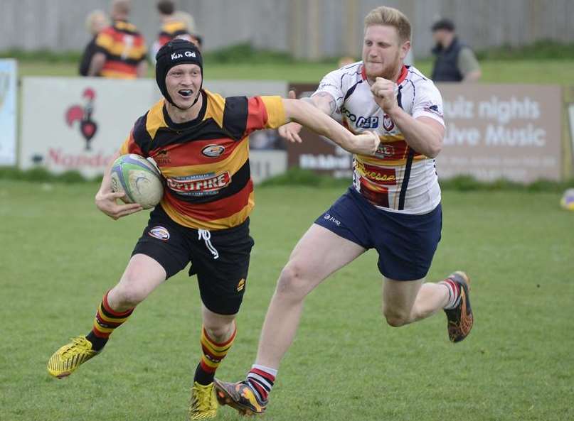 Sheppey give chase against Ashford. Picture: Paul Amos