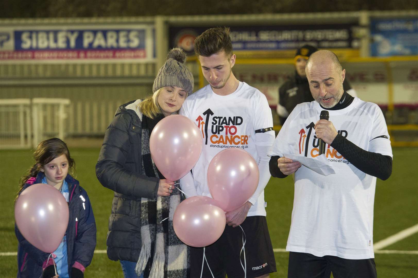 Tom during a memorial to his mum at the start of his first charity football match